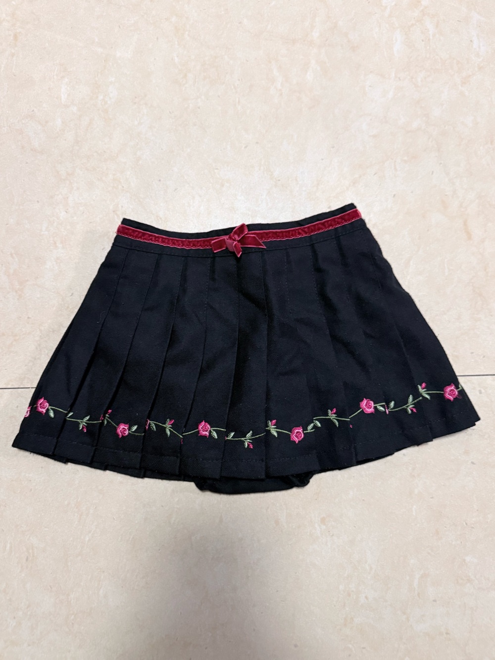 Place Black Skirt with Pink Rose Trim